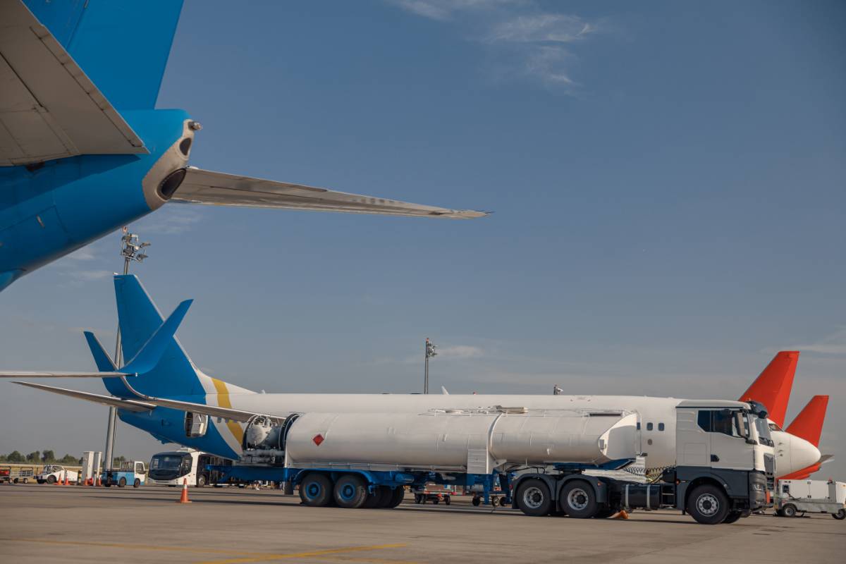 airplane-in-airport-refueling-before-flight-with-b-2024-10-18-08-11-23-utc Yodh Energy